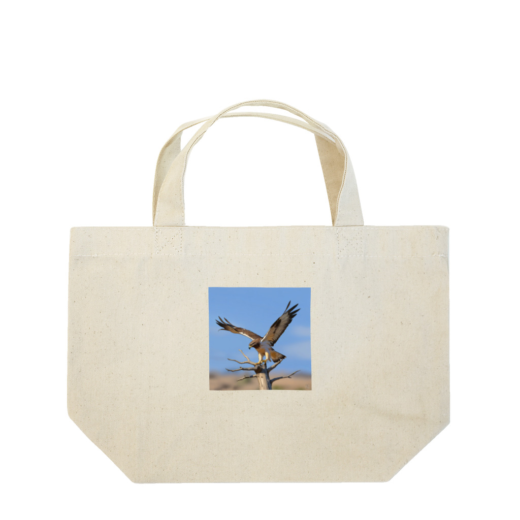 ganeshaの群れの中で他の人と協力しているタカ Lunch Tote Bag