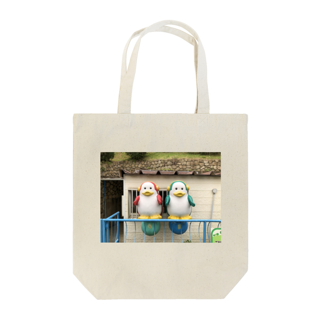 ネオンのレトロなペンギンカップル Tote Bag