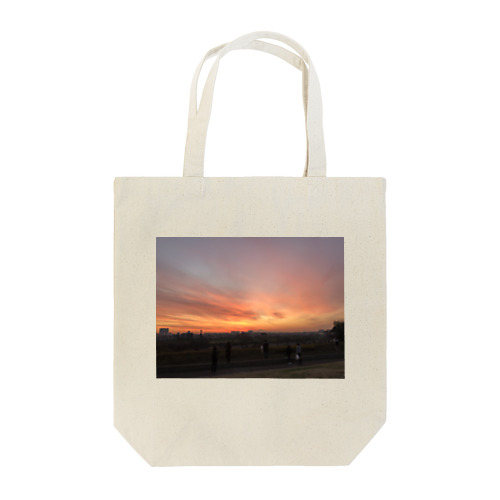 while gazing at the gorgeous setting sun Tote Bag