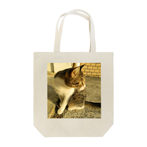 夕陽を眺めるマズル Tote Bag