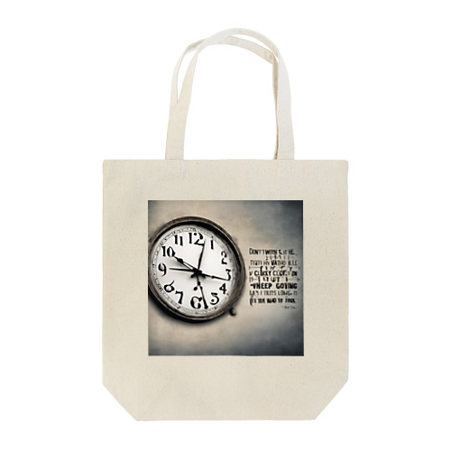 Don't watch the clock; do what it does. Keep going. Tote Bag