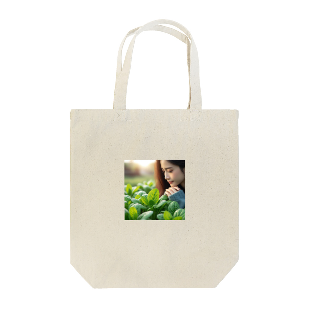 大地の宝物の畑のほうれん草に感動するお姉さん Tote Bag