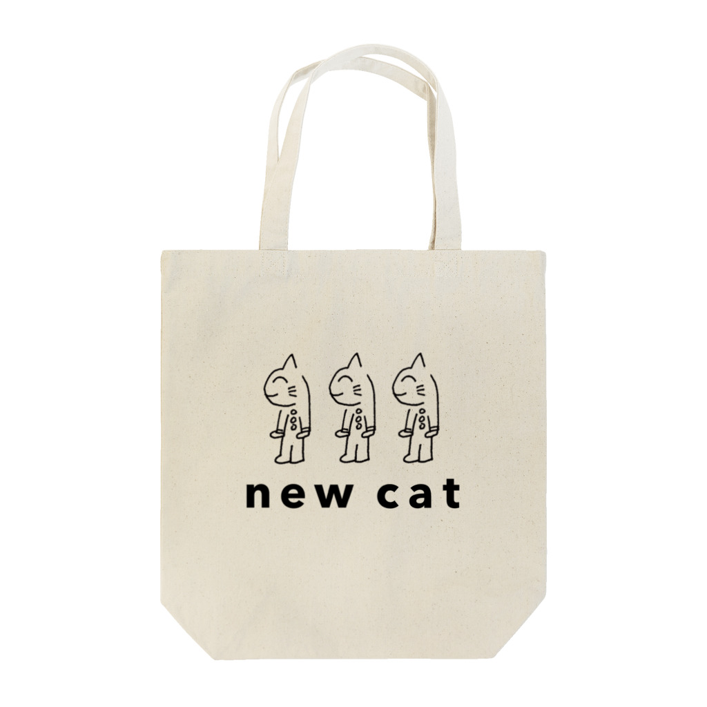 白と水色のカーネーションストアの新しいねこ（new cat）Tシャツ トートバッグ