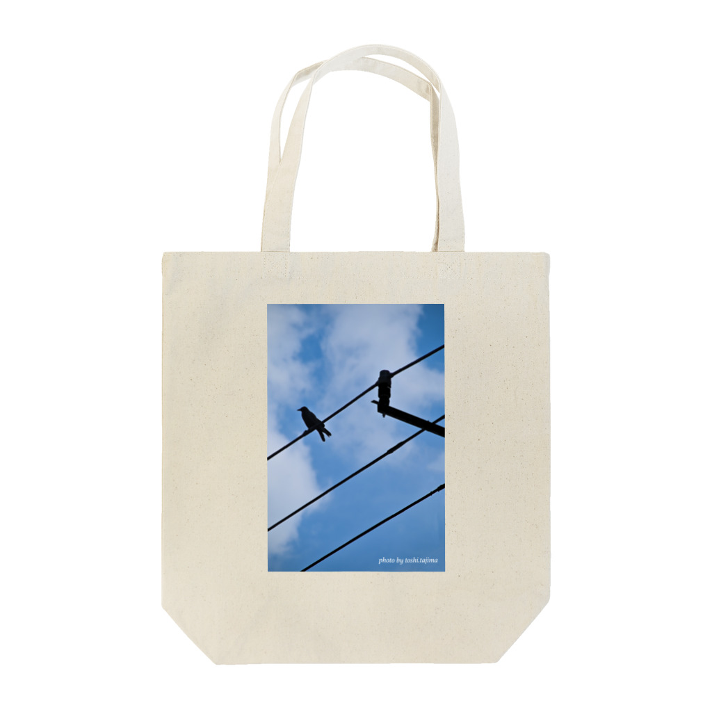 トシタジマの店の青空カラス Tote Bag