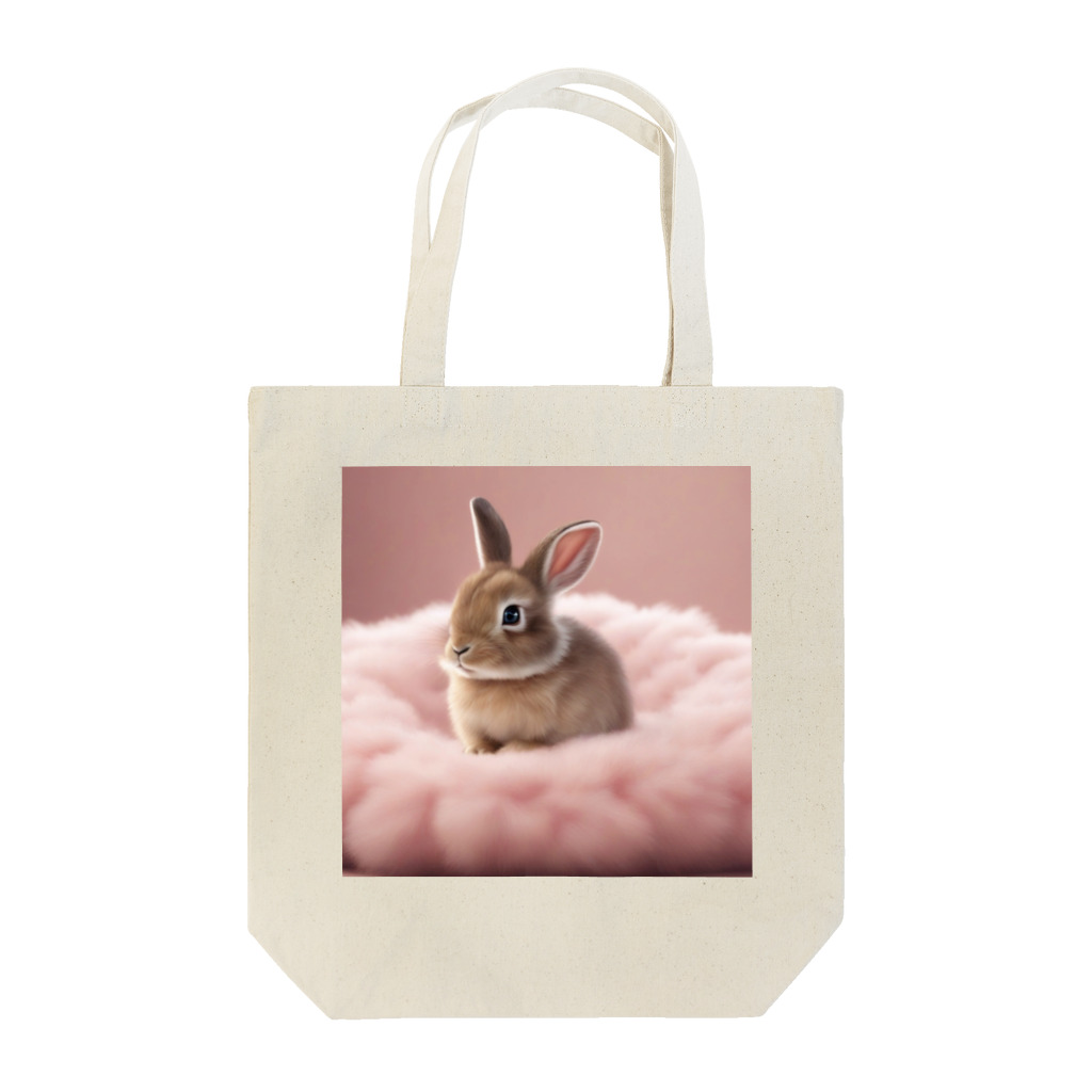 キャリーのふわふわのクッションで遊ぶウサギの赤ちゃん Tote Bag