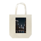 Chop Storeの夜に輝くビル Tote Bag