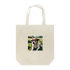 kokin0の草むらで斜めを見つめる犬 dog looking for the anywhere Tote Bag