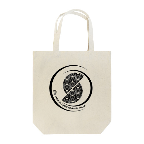 The moon is reflected in the waves Tote Bag