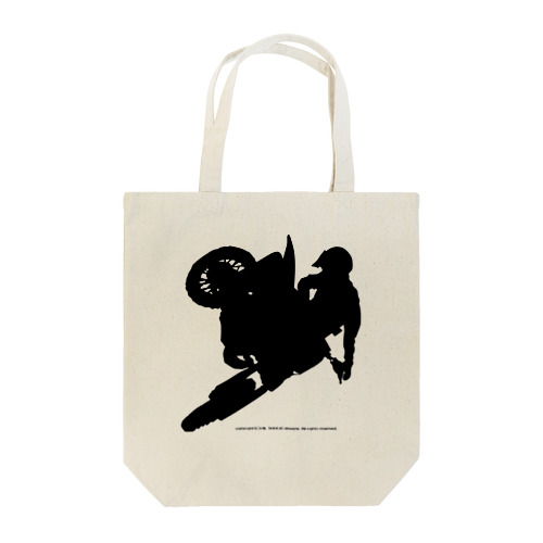 オフロードバイクでエアーを決めるシルエット Tote Bag