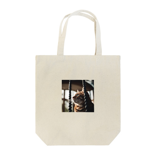 タワーに登っている猫 Tote Bag