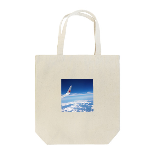 飛行機と雲の上 Tote Bag