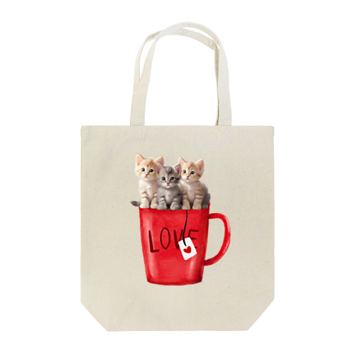 赤いマグカップの上の子猫たち Tote Bag