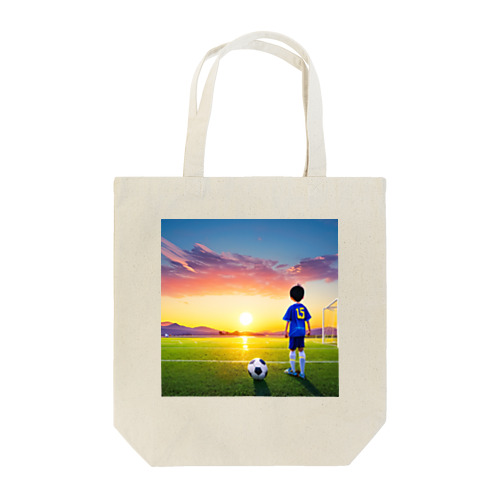 夕日とサッカー少年 Tote Bag