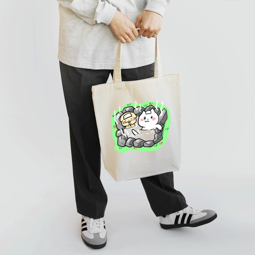 ももにゅのグラスに飲み物を注ぐと Tote Bag