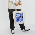 Kissy SmileyのKissy@Smiley/青色の花 Tote Bag