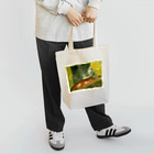 mitzho_nakataのa drinking prayer  Tote Bag