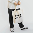 FUN TIMES POSITIVE VIBES。 のBORN LUCKY Tote Bag