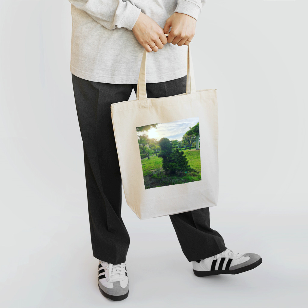 ティザンノの怪獣の植木アート Tote Bag