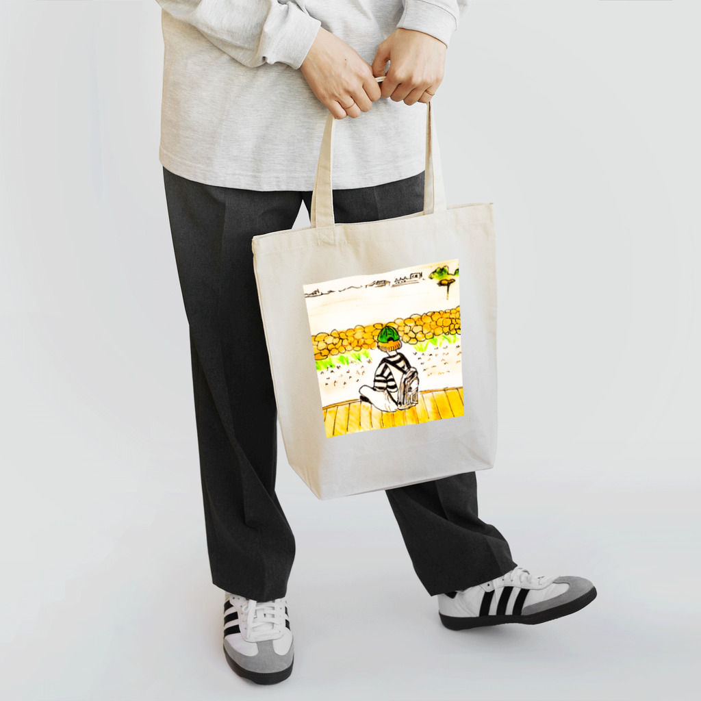 鳥取カランコロンの川でくつろぐ女の子 Tote Bag