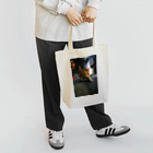 シッポ追いの猫写真店のInto the night Tote Bag