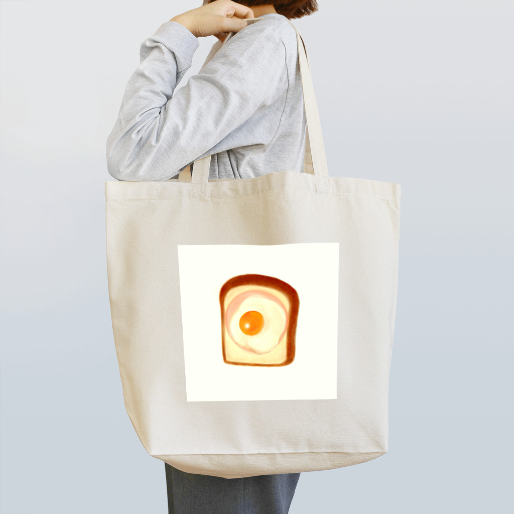 パン屋の食パンにハム、目玉焼き Tote Bag