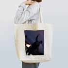 supergirlstoreの暗闇の中の明るい笑顔 Tote Bag