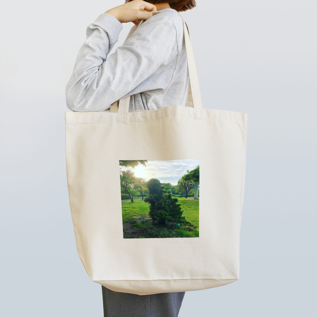 ティザンノの怪獣の植木アート Tote Bag