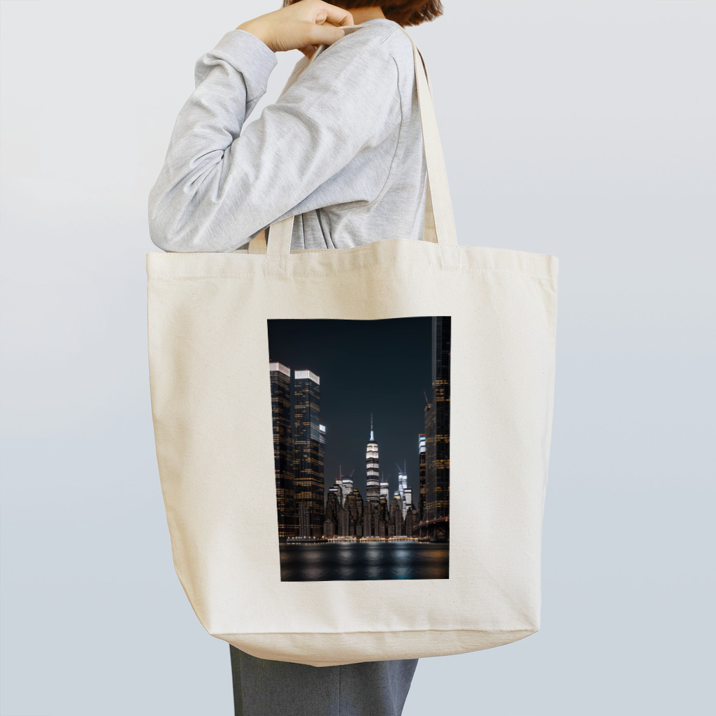 Chop Storeの夜に輝くビル Tote Bag