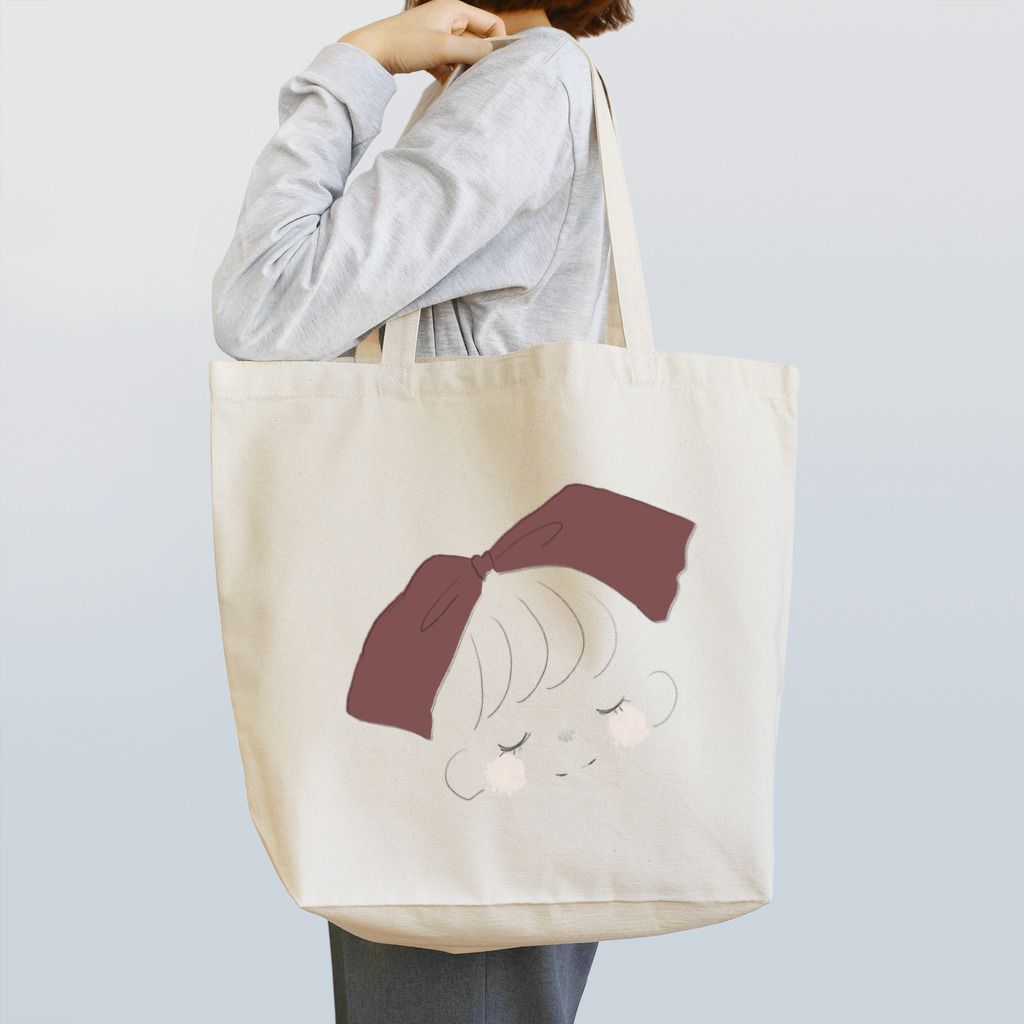 ゆるかわいいデザインのおっきい赤色リボンの女の子。 Tote Bag