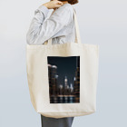 Chop Storeの夜に輝くビル Tote Bag