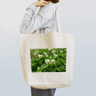 黒豹の幸せを運ぶお花 Tote Bag